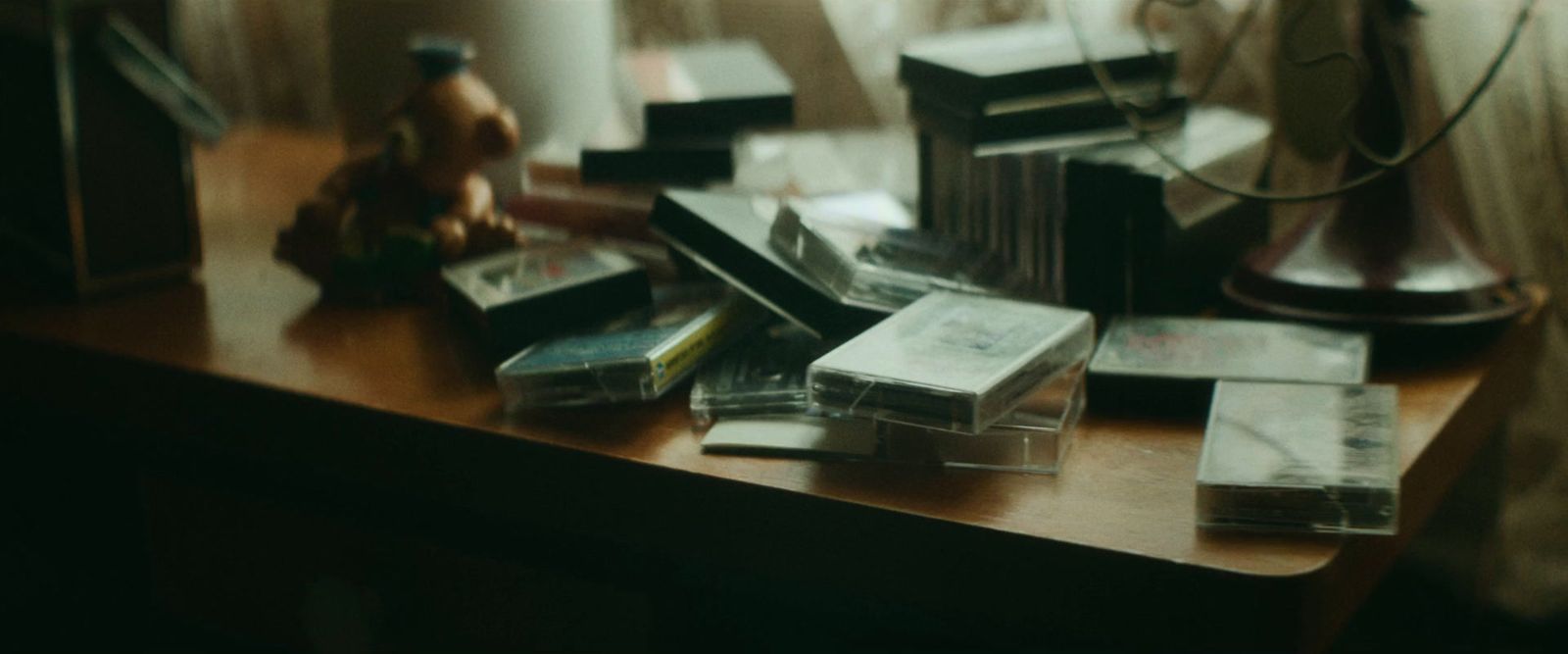 a wooden table topped with lots of books