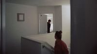 a couple of people that are standing in a room
