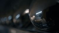 a close up of a metal object with a blurry background