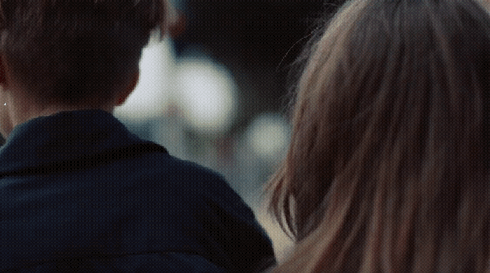 a man and a woman standing next to each other