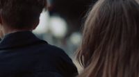 a man and a woman standing next to each other
