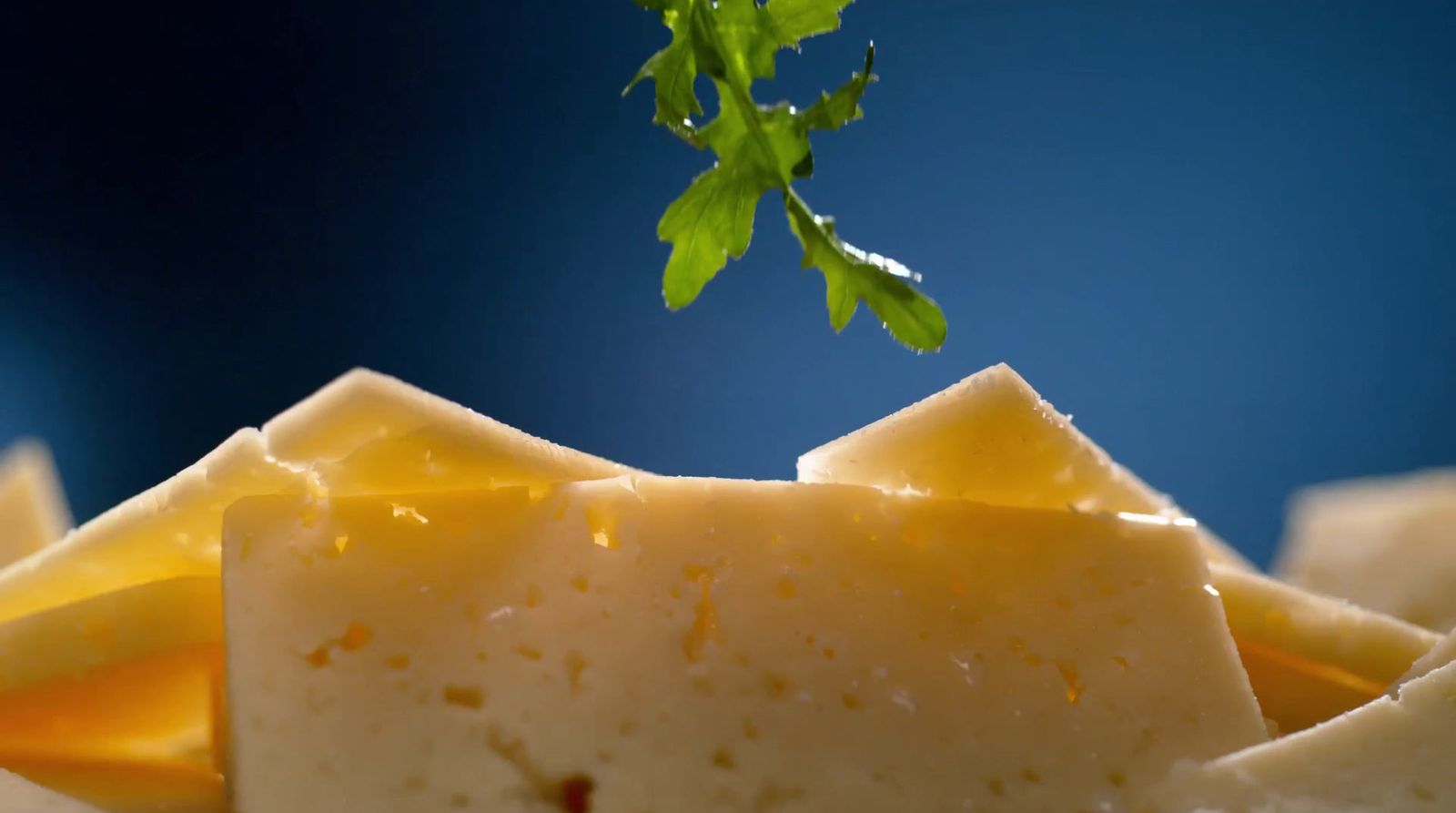 a piece of cheese sitting on top of a table