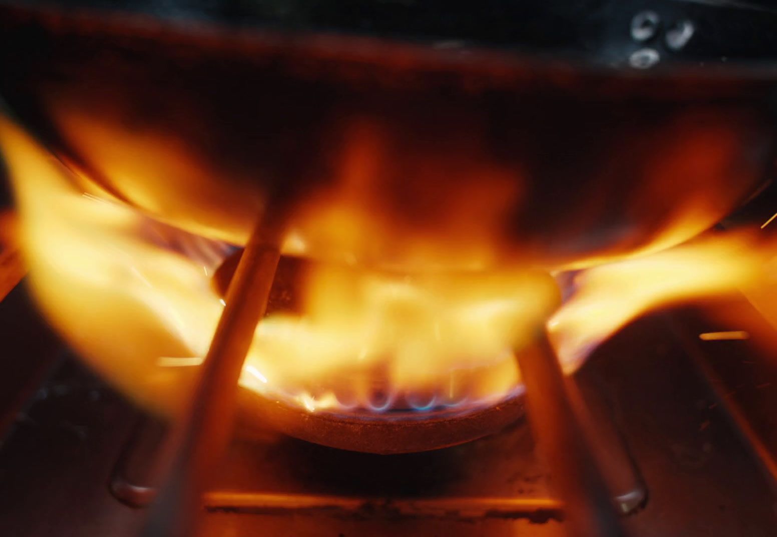 a close up of a fire burning in a stove