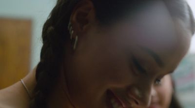 a close up of a person with a cell phone