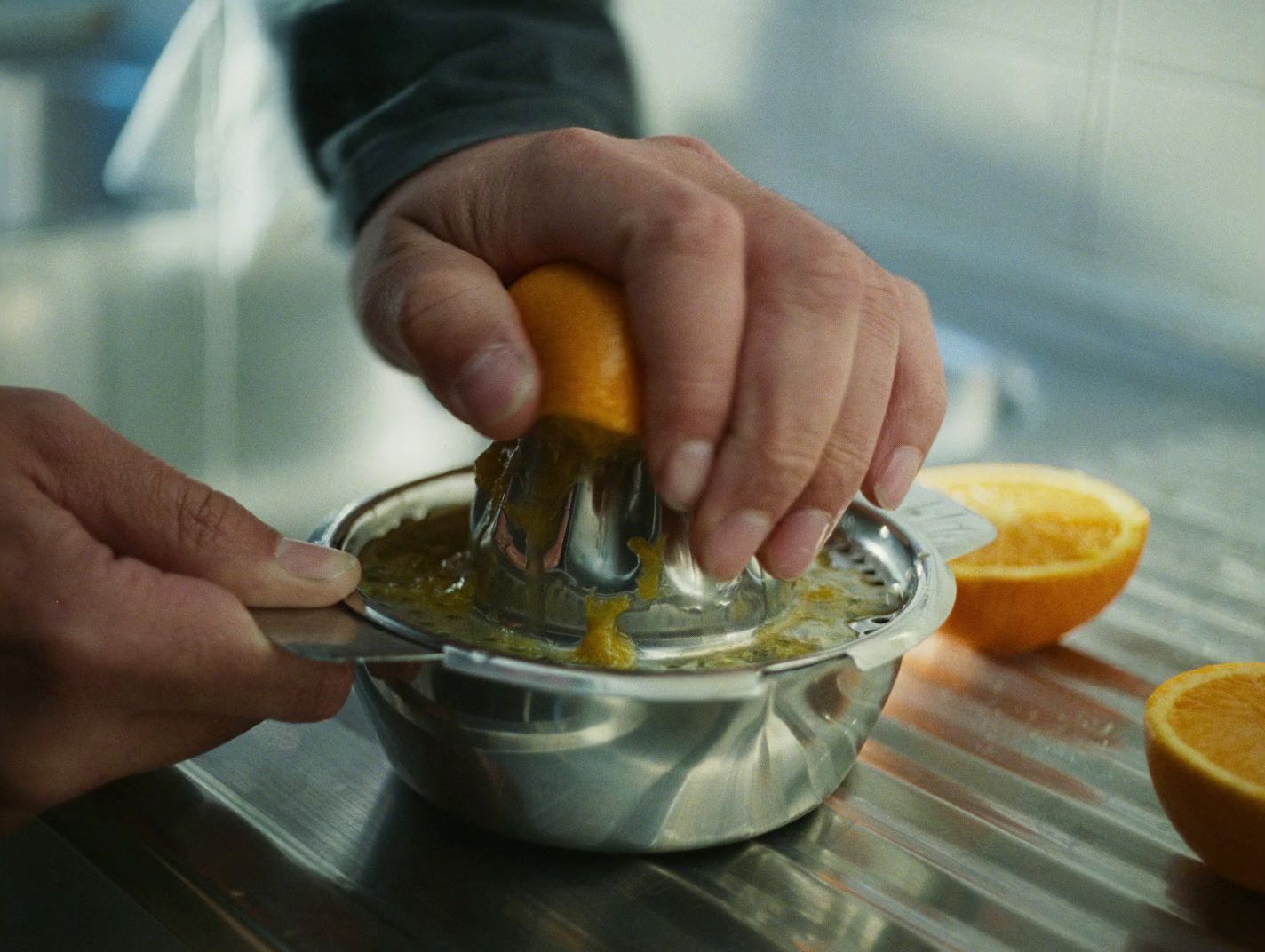 a person using a hand mixer to mix something in a bowl