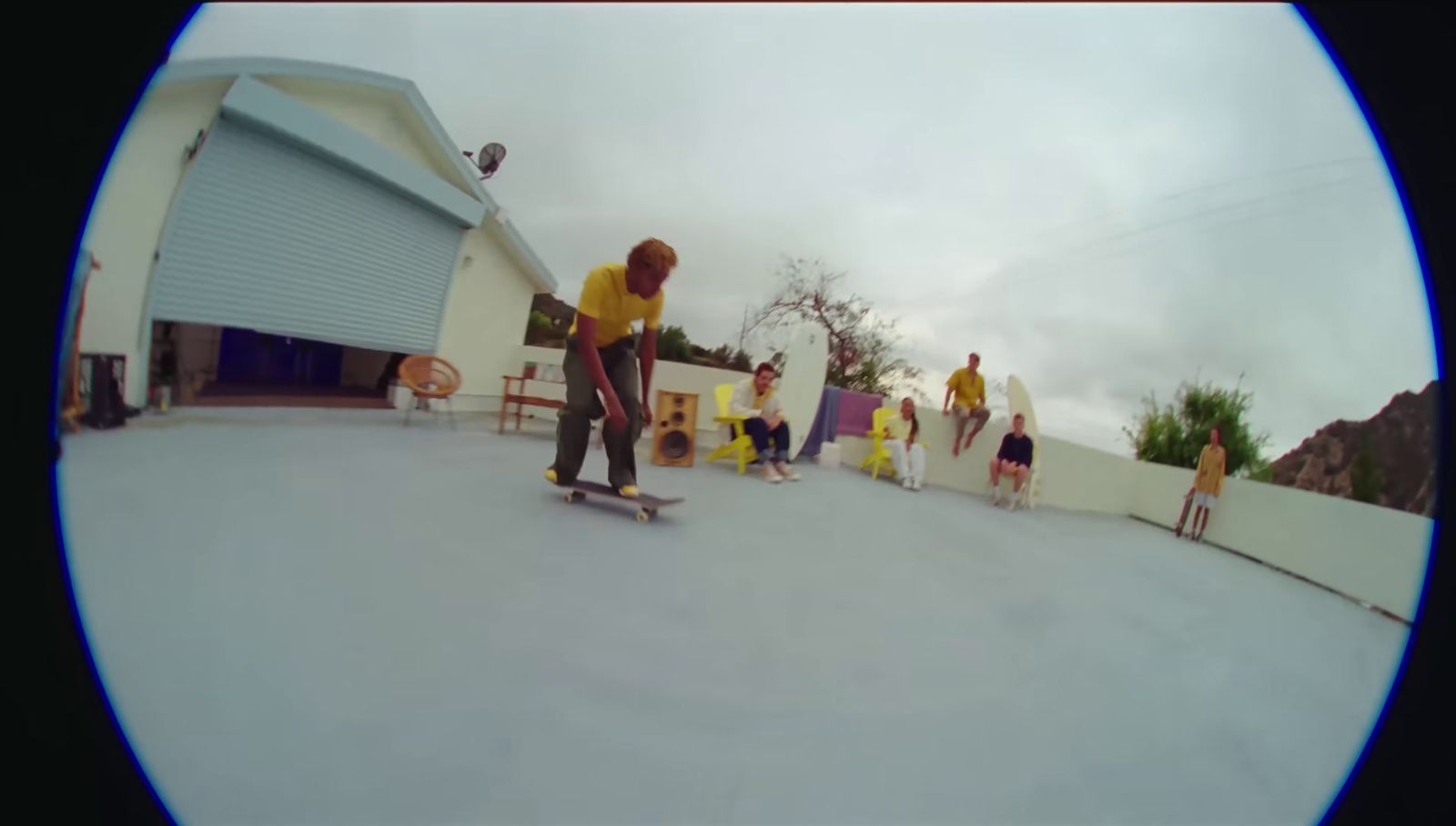 a man riding a skateboard down a street