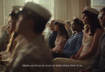 a group of women sitting next to each other