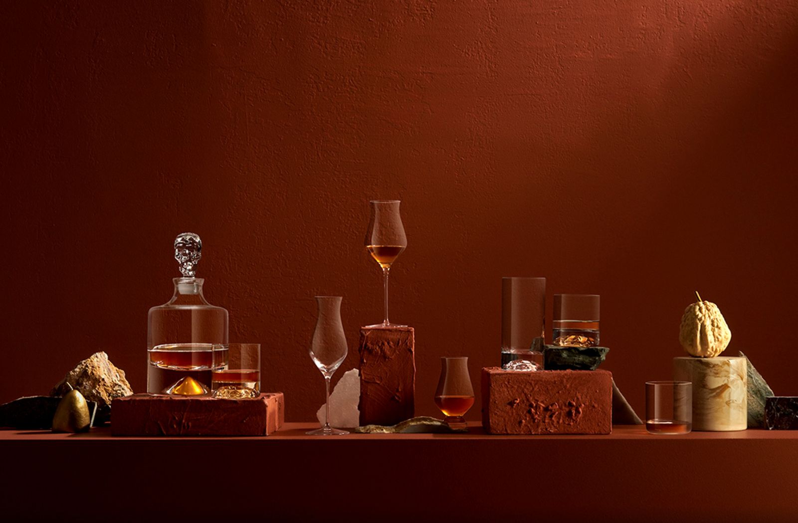 a table topped with bottles and glasses of wine