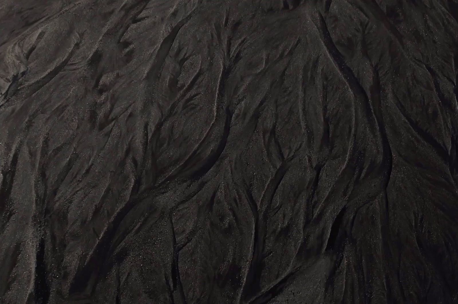 a close up of a black fur texture