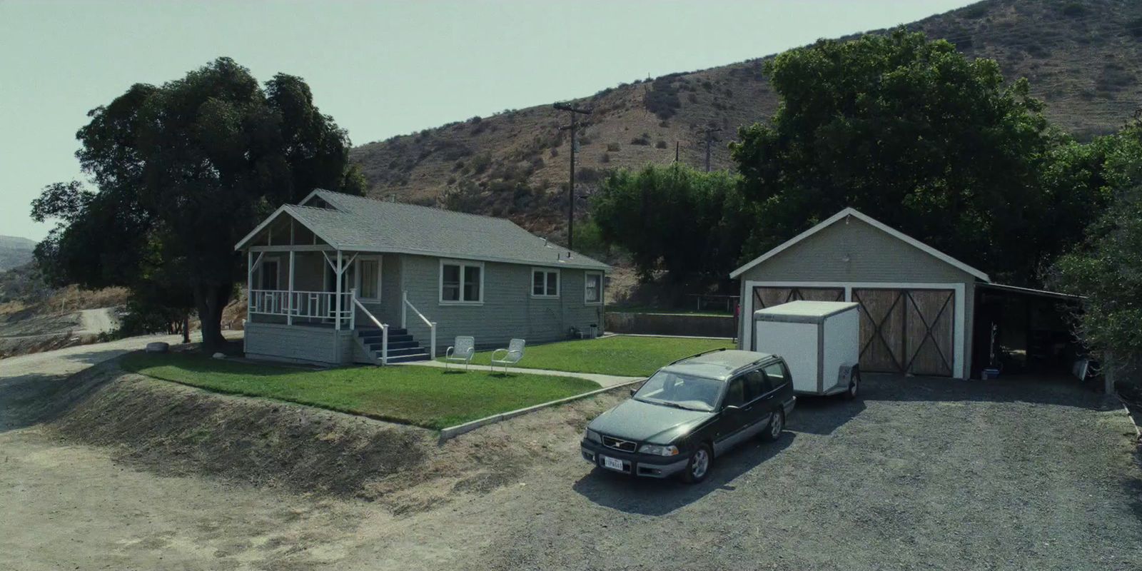 a car is parked in front of a house