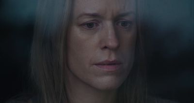 a close up of a person with long hair
