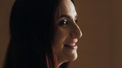 a close up of a person with long hair