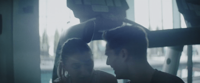 a man and a woman sitting next to each other