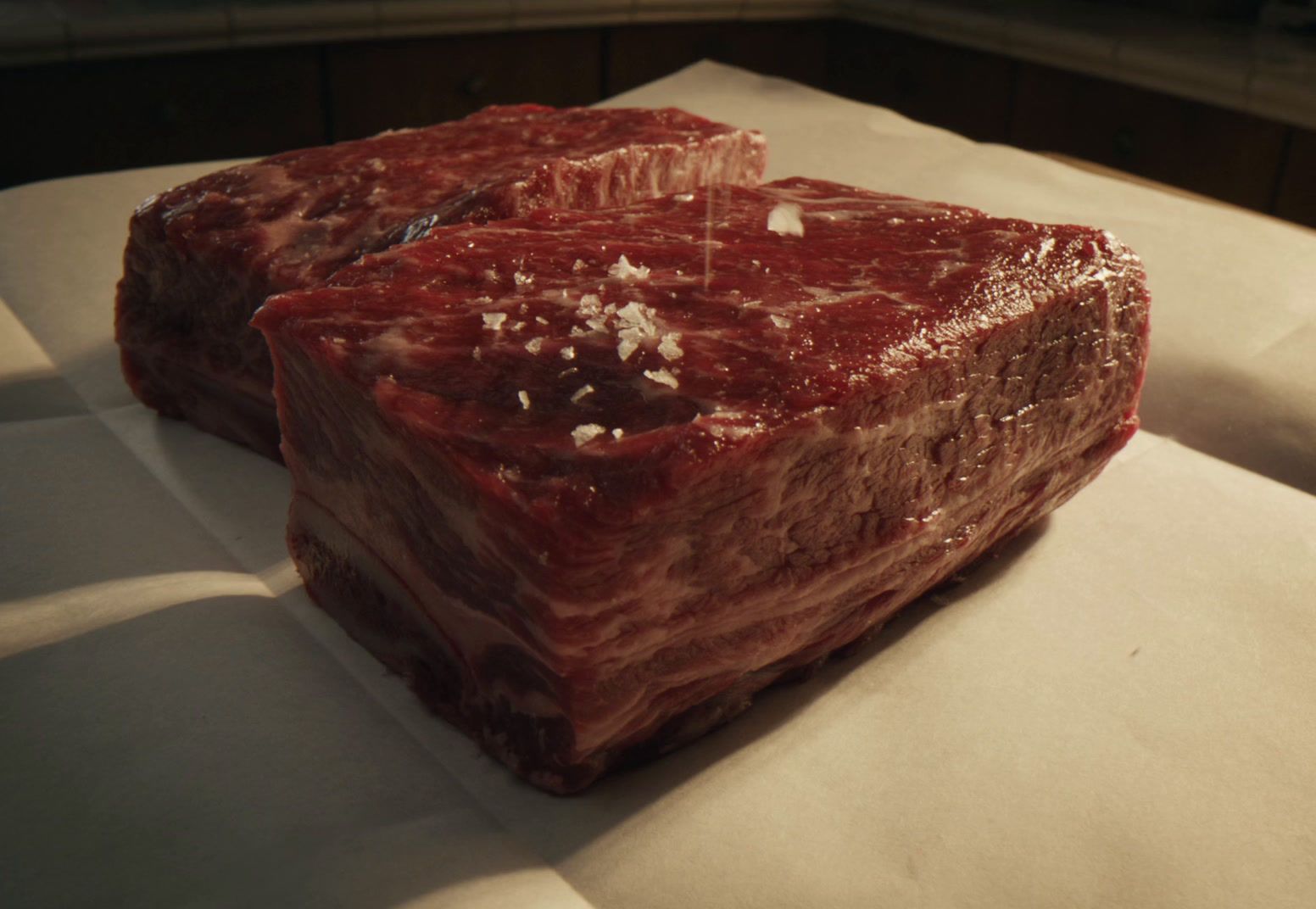 a close up of a piece of meat on a table