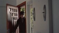 a man standing in front of a door
