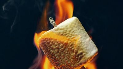 a piece of bread sitting on top of a fire