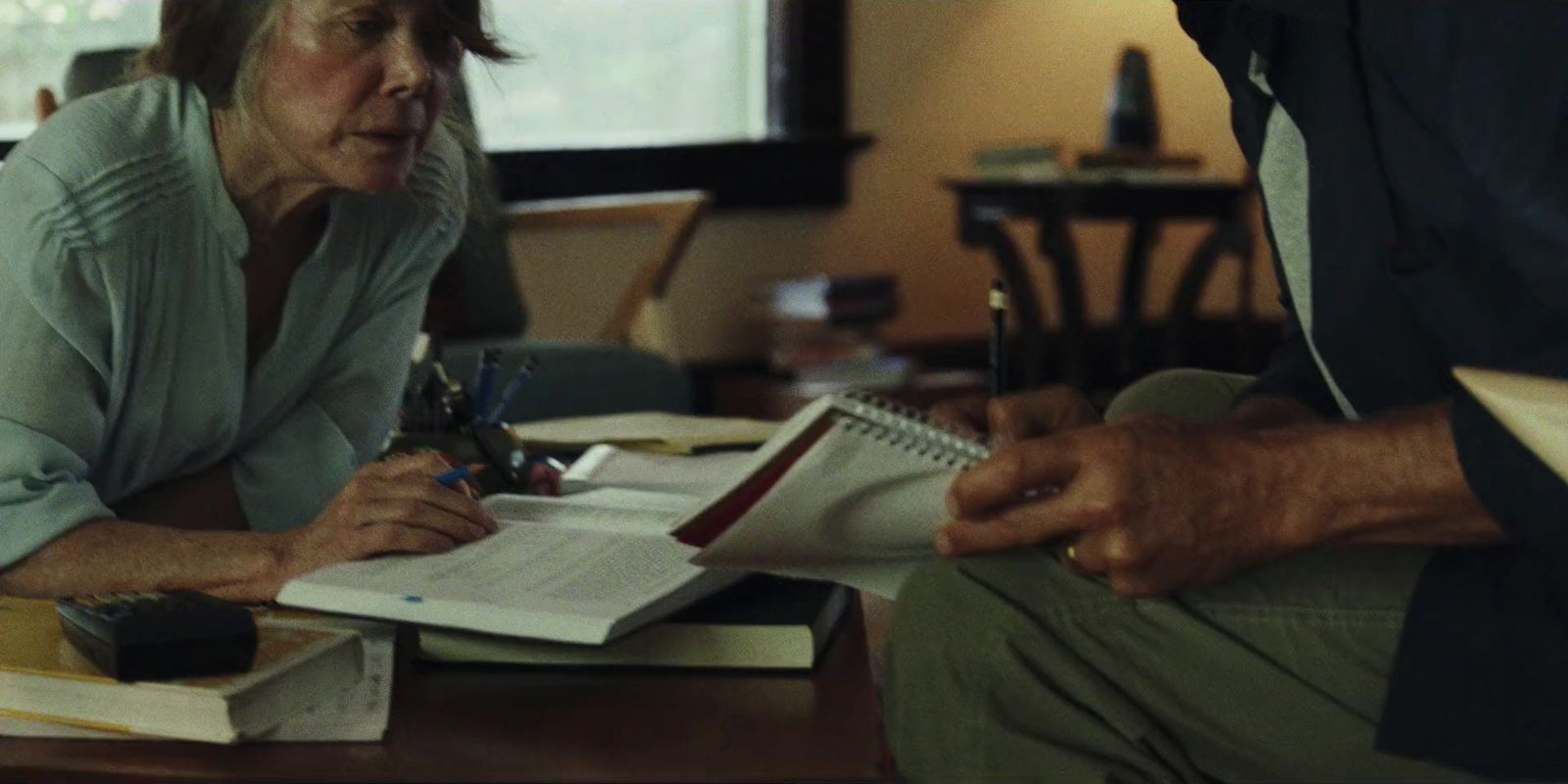 a man and a woman sitting at a table