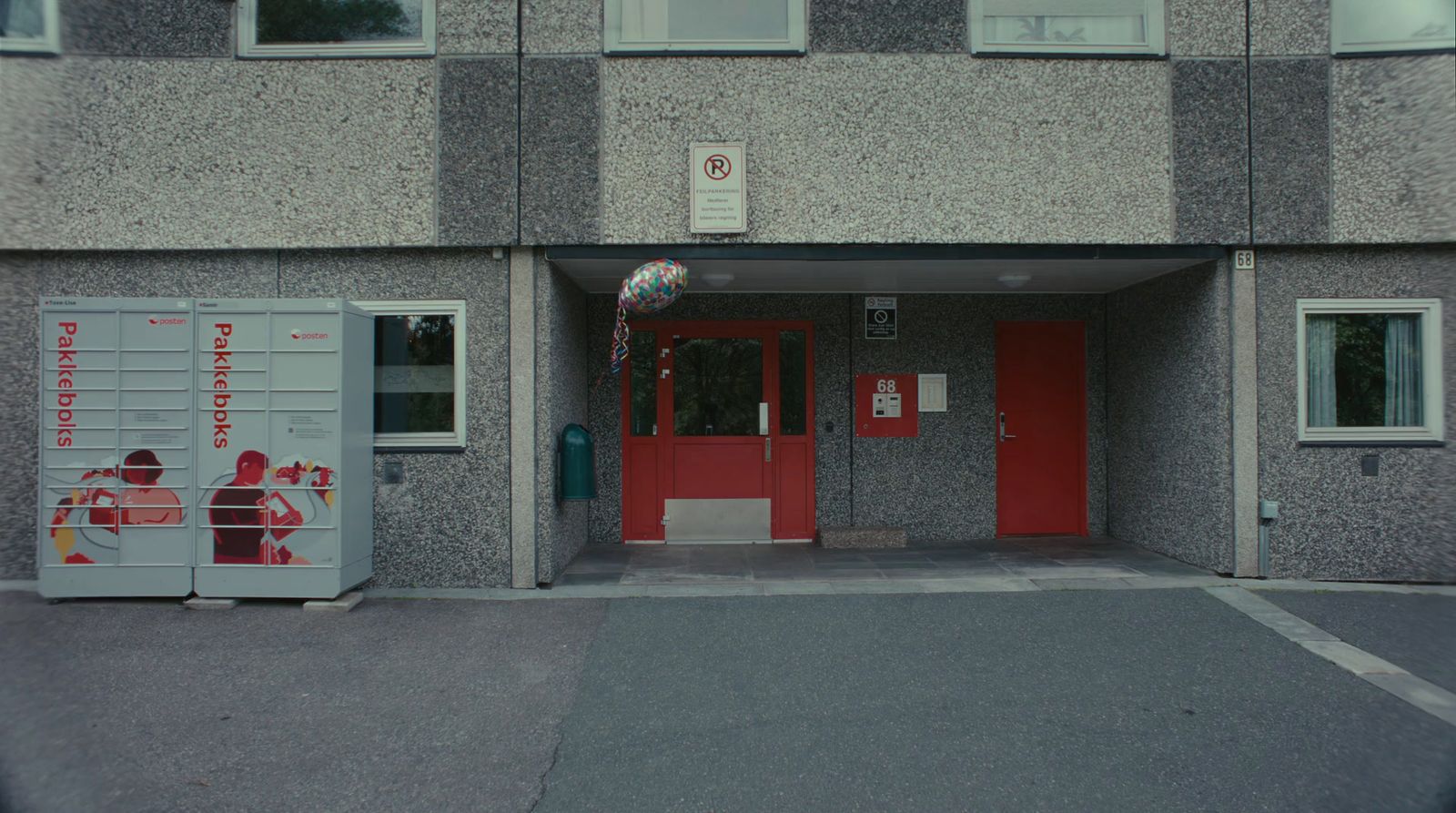a building with a red door and a red door