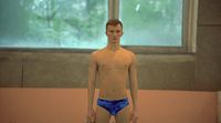 a man in a swimming suit standing in front of a window