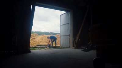 a man standing in a doorway of a building