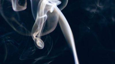 a close up of smoke on a black background