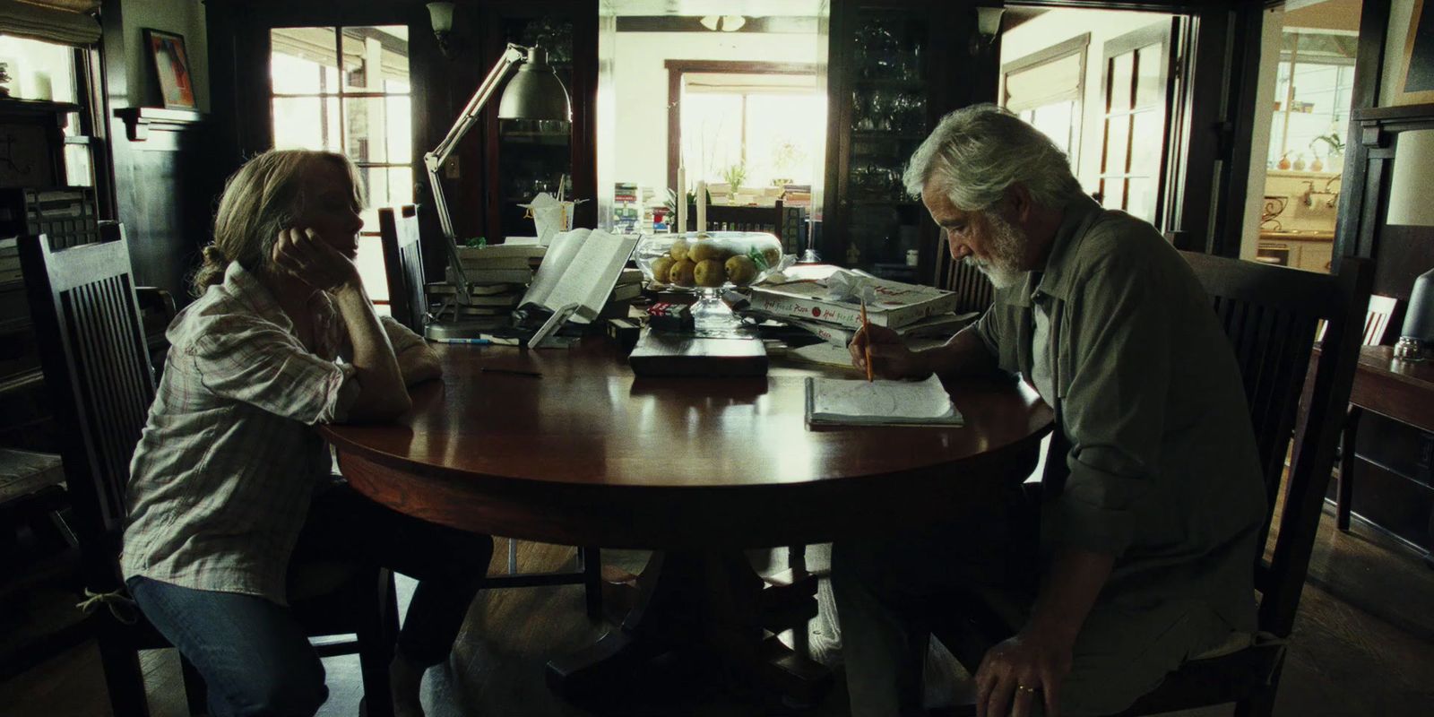 a man and a woman sitting at a table