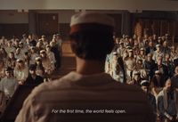 a man standing in front of a crowd of people