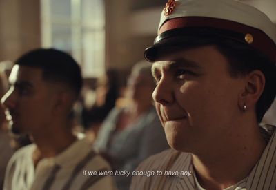 a man in a sailor's hat with a quote on it