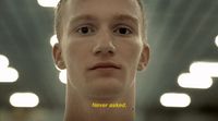 a man with a serious look on his face