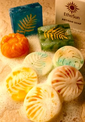 a soap bar with four different colored soaps