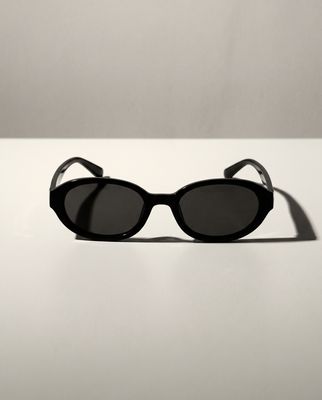 a pair of sunglasses sitting on top of a table