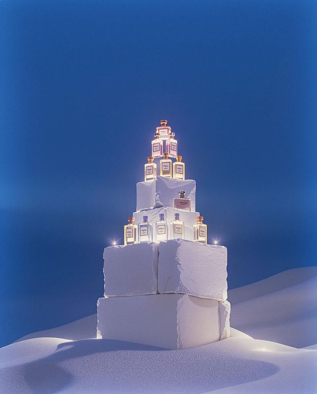 a very tall tower made out of blocks in the snow