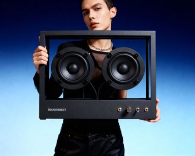 a woman holding a speaker in front of her face