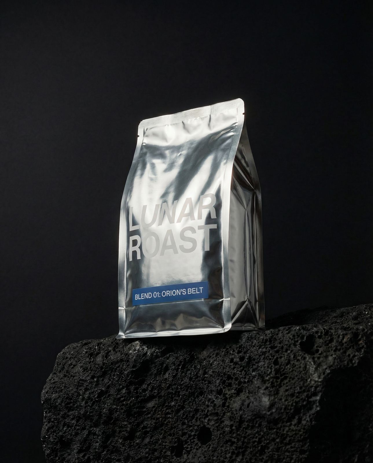 a bag of coffee sitting on top of a rock