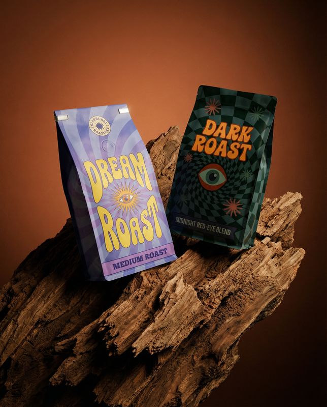 a bag of dark roast next to a bag of dark roast