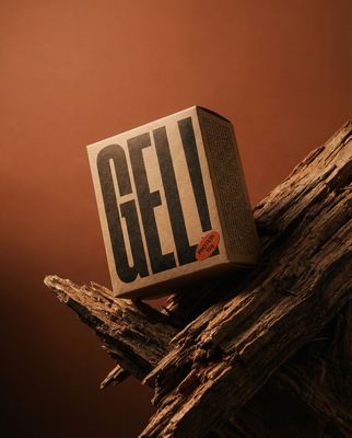 a box sitting on top of a piece of wood