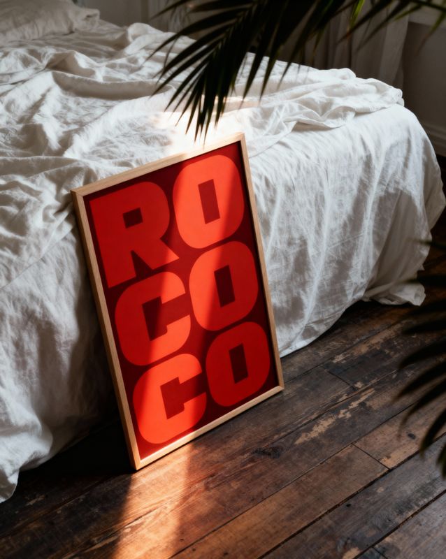a red sign sitting on top of a wooden floor