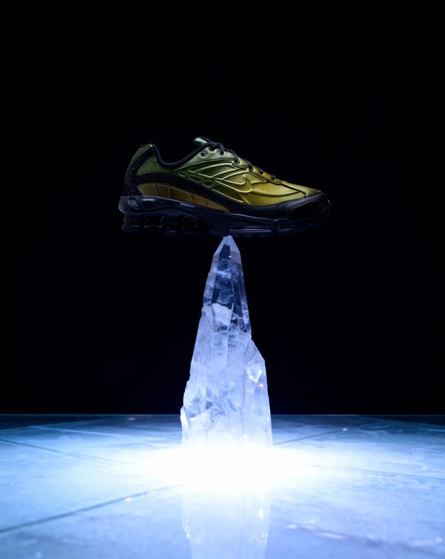 a pair of shoes that are on top of a piece of ice