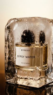 a bottle of water sitting on top of ice