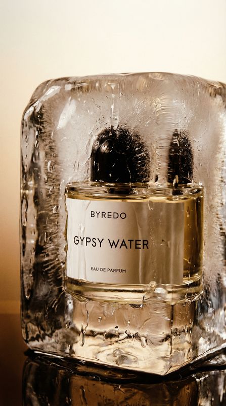 a bottle of water sitting on top of ice