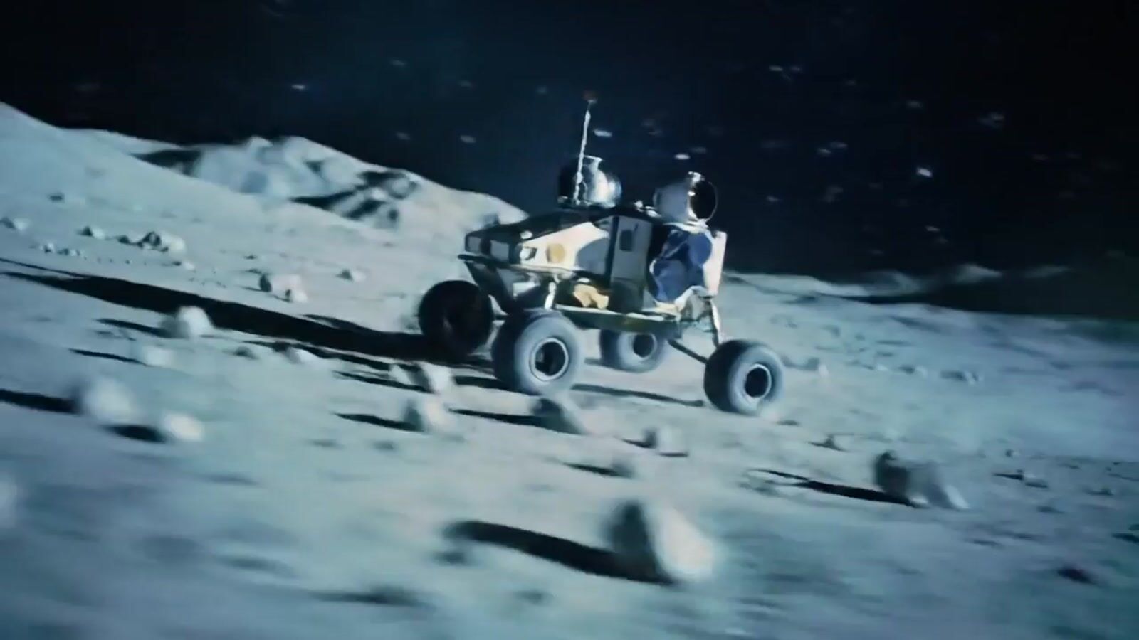 a man riding on the back of a truck on top of a moon