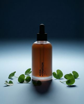 a bottle of liquid sitting on top of a table