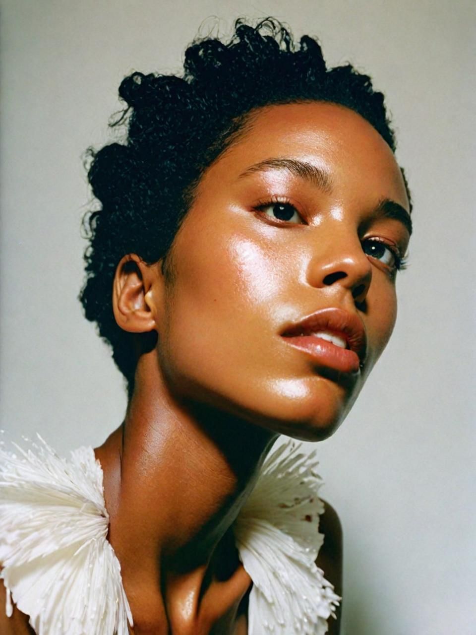 a close up of a person wearing a white shirt