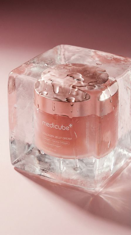 a jar of cream sitting on top of an ice block