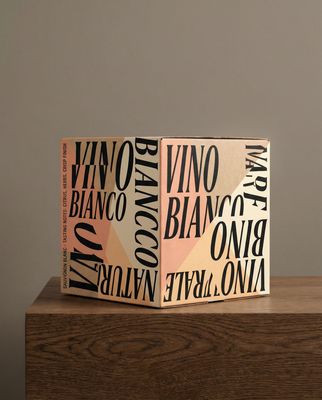 a wooden box sitting on top of a wooden table