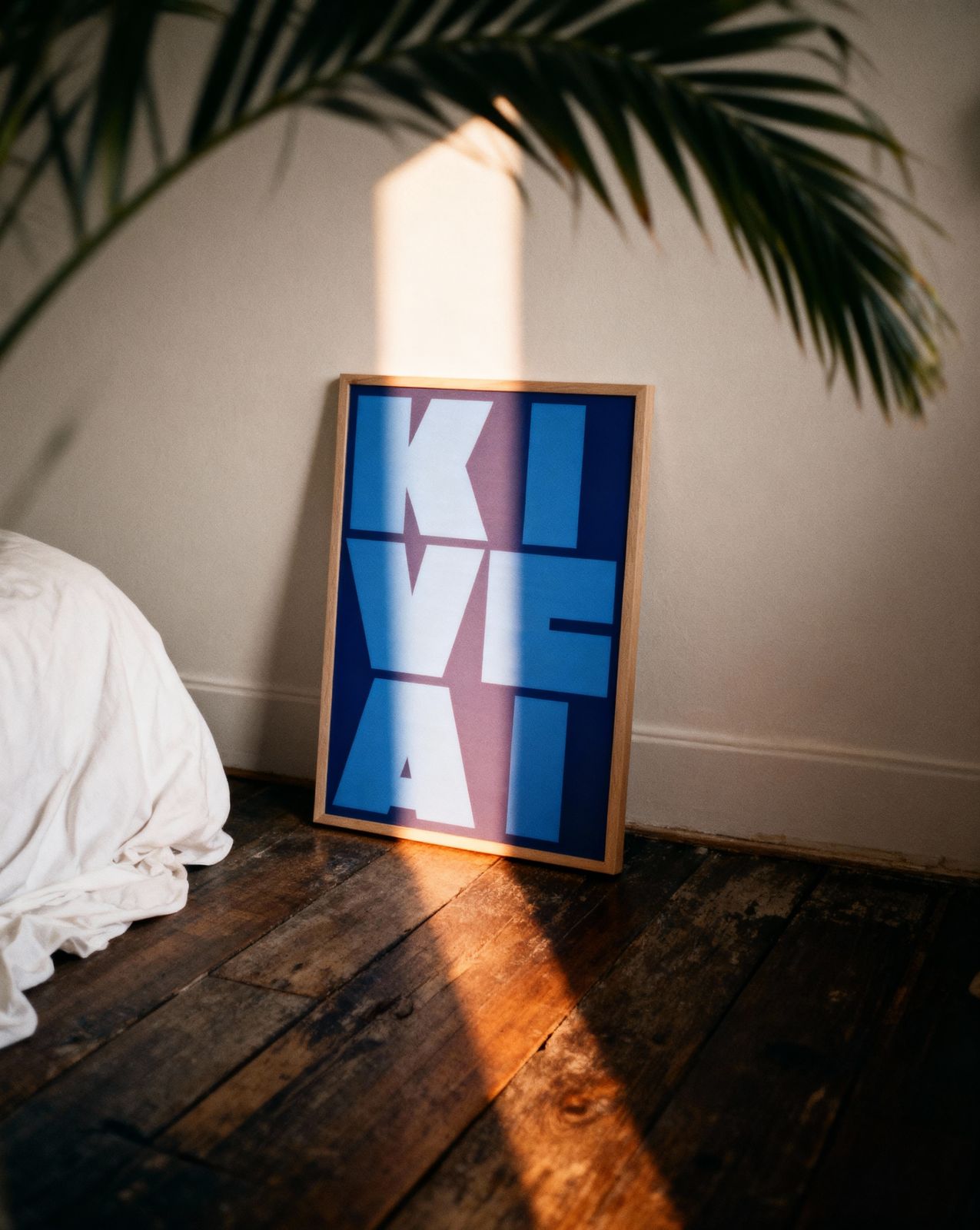 a picture frame sitting on top of a wooden floor