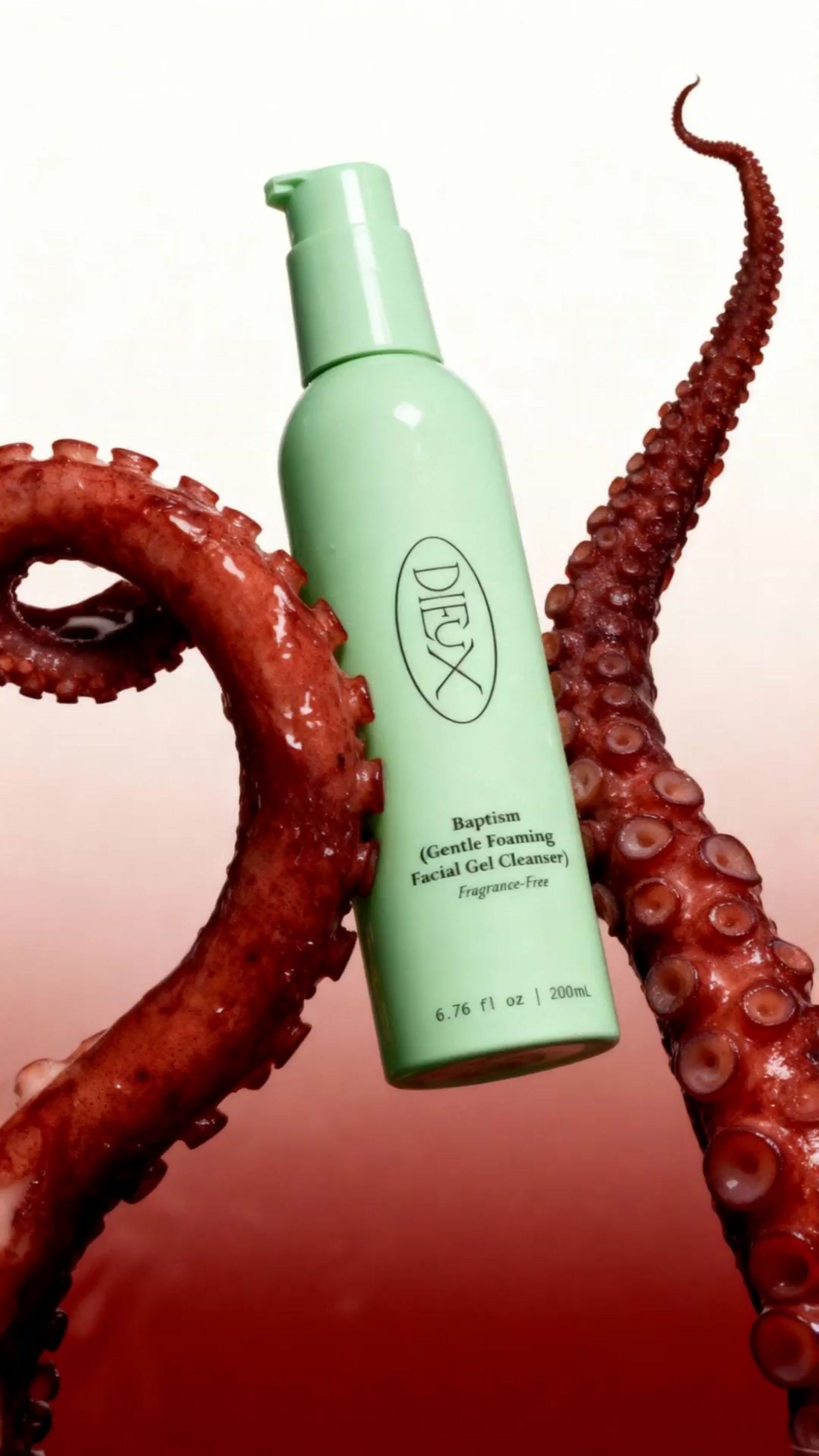 a bottle of deodorant next to an octopus