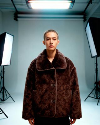 a man standing in front of a camera