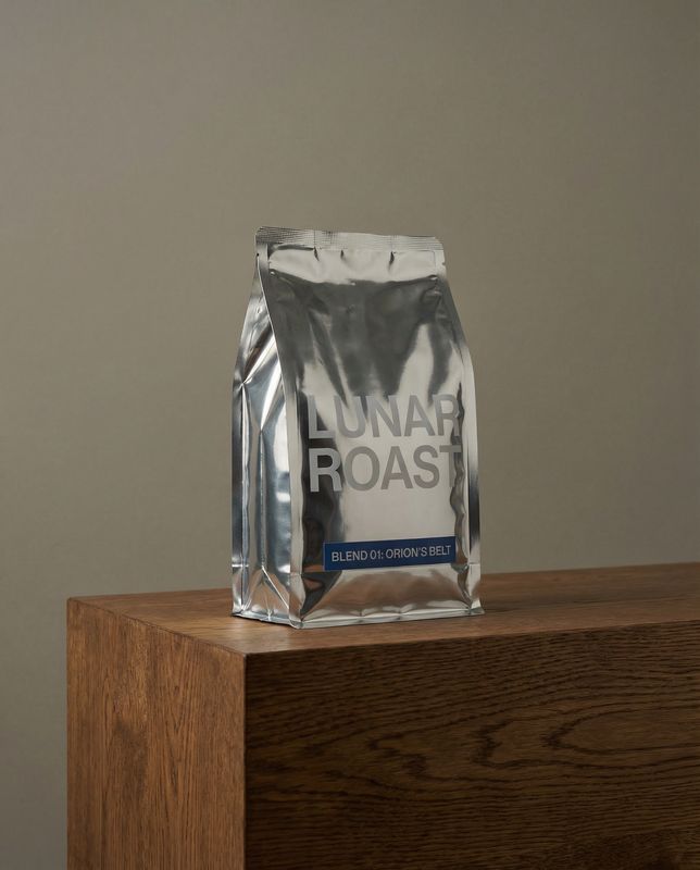 a bag of coffee sitting on top of a wooden table