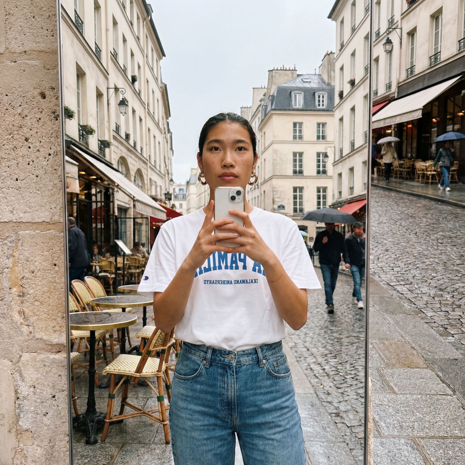 a woman taking a selfie in front of a mirror